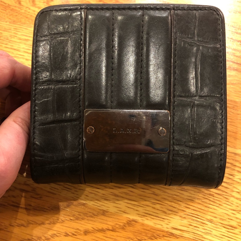 Leather L.A.M.B. wallet.